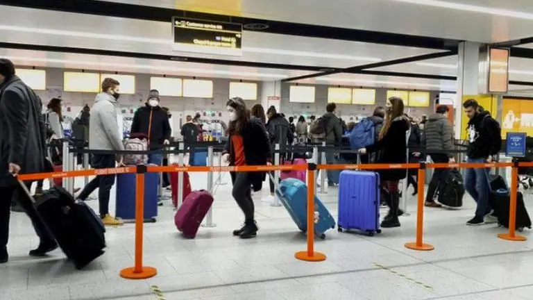 The Latest: US requires UK passengers to get negative test