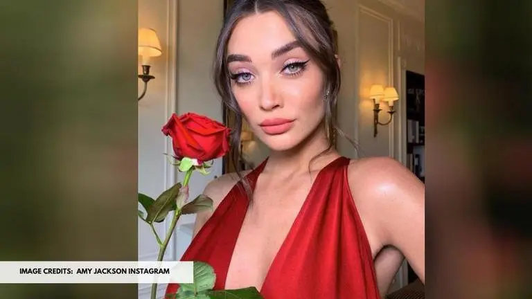 Amy Jackson sizzles in red as she poses with her dog Amy Jackson