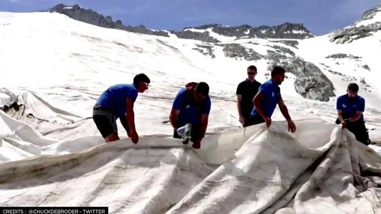 Italian Glacier covered with white cloth to decelerate melting caused by climate change Italian Glacier