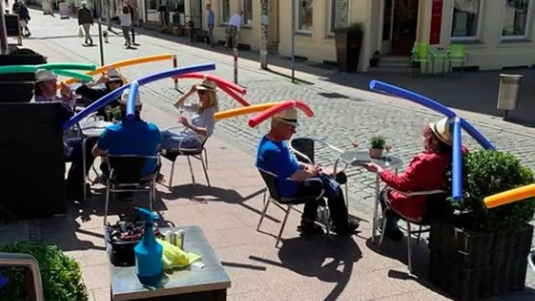 Germany: Cafe makes customers wear pool noodle hats to maintain social distancing Germany