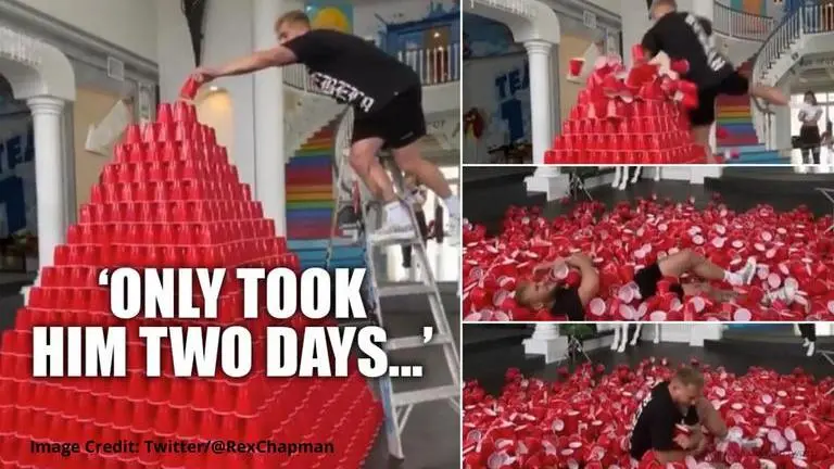 Cup pyramid built during quarantine comes crashing down after man falls face forward on it quarantine