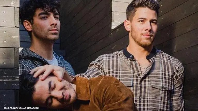 Nick Jonas digs out old pics ahead of 'I Need You Christmas' song release, pens note Nick Jonas