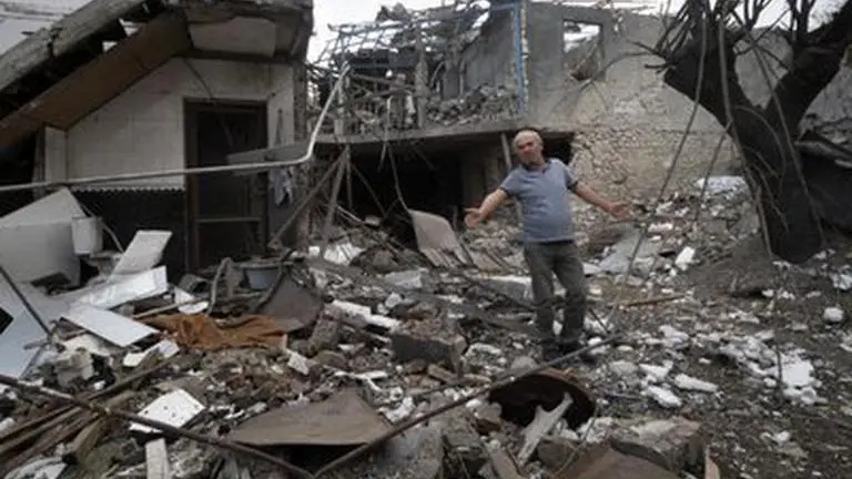 Armenian father tells of life under daily bombings Armenian father tells of life under daily bombings