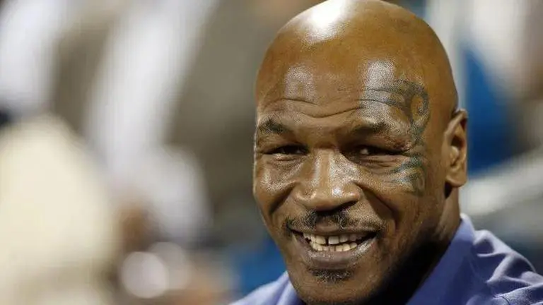 No charges for Mike Tyson for punching airplane passenger Mike Tyson