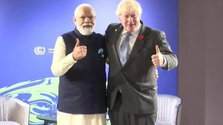 Boris Johnson lauds PM Modi's commitment to climate action, says UK will work with India Boris Johnson