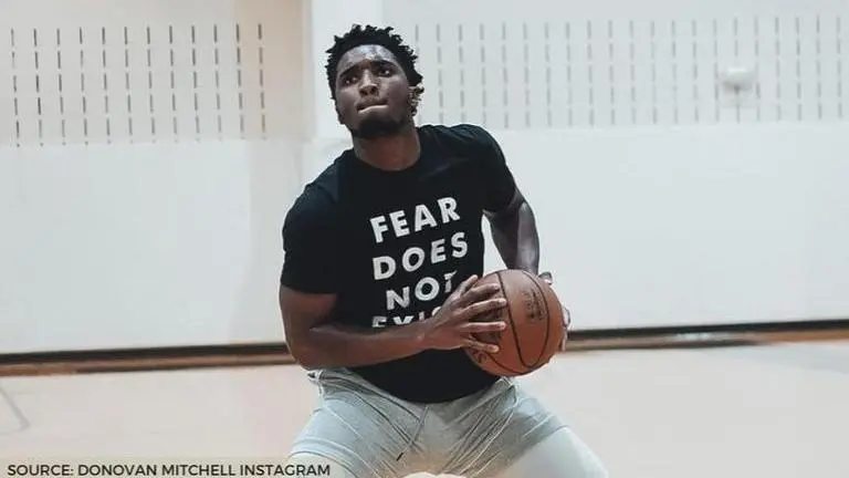 Donovan Mitchell jumps into his pool after signing his $195 million contract extension donovan mitchell