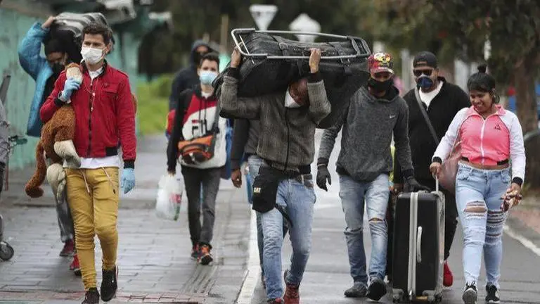 Some Venezuelans return home as virus spread