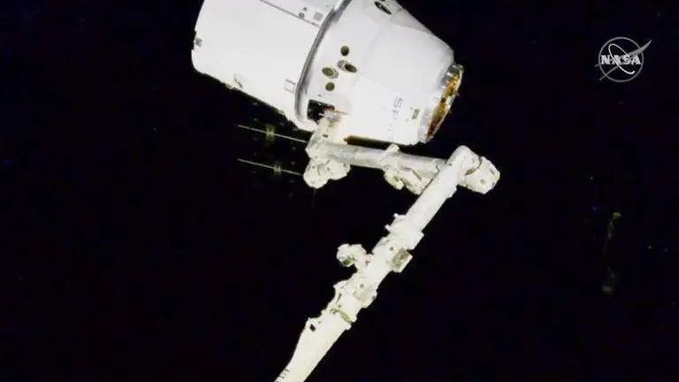 SpaceX's 20th station shipment arrives with candy, science SpaceX's 20th station shipment arrives with candy, science