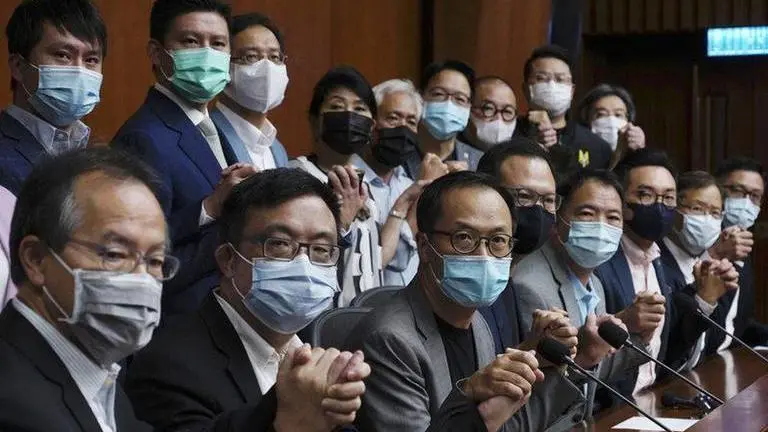 Hong Kong's pro-democracy lawmakers threaten to quit Hong Kong's pro-democracy lawmakers threaten to quit