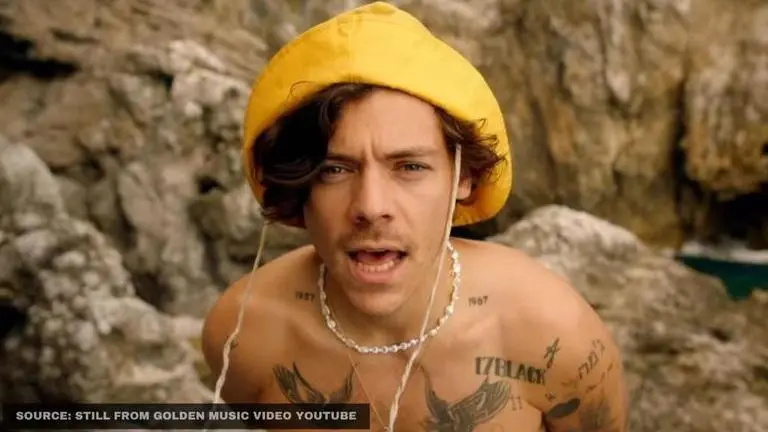 Harry Styles flaunts tattooed body & quirky outfits in picturesque music video of 'Golden' harry styles