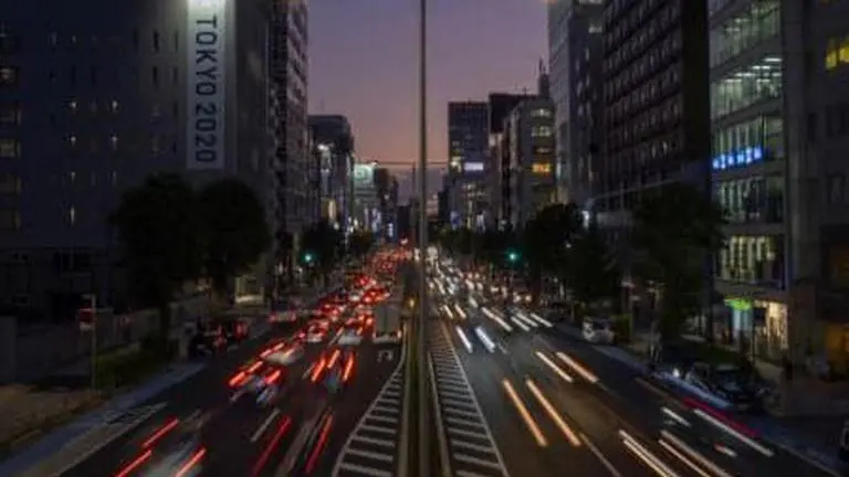 Japan pandemic-hit economy returns to growth July-September