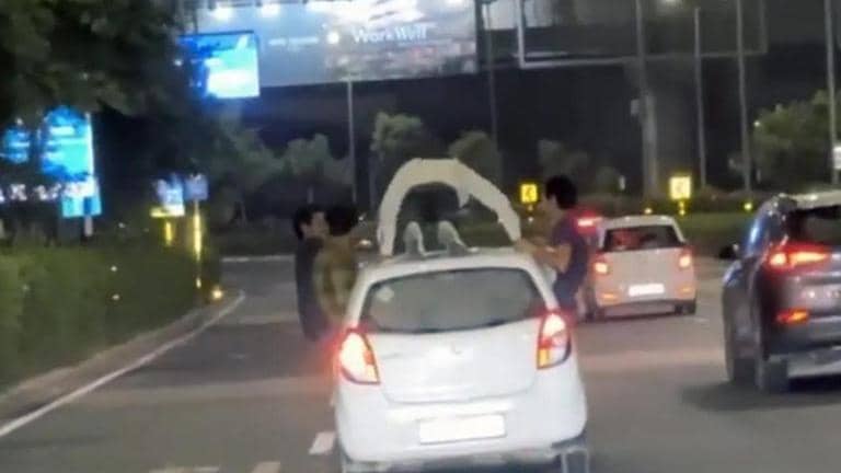Gurugram man seen drinking, dancing and doing push-ups on top of a ...