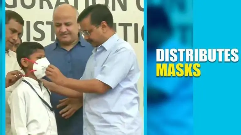 Delhi CM distributes masks to students as pollution levels increase Delhi CM