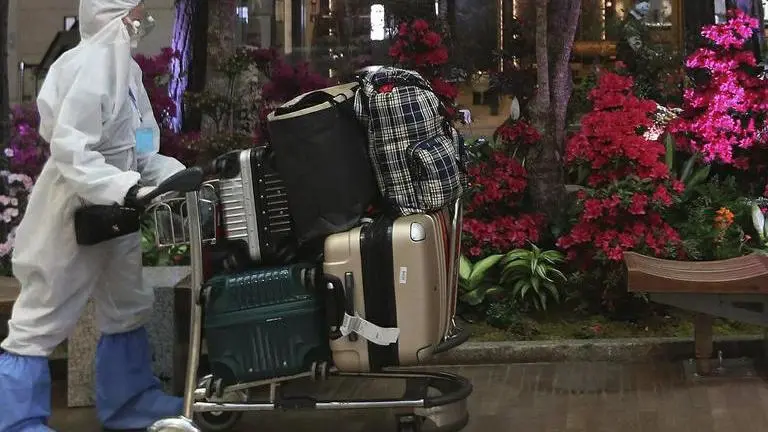 The Latest: Japan, China, South Korea leaders to share info