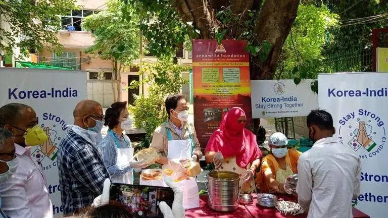 South Korean Embassy partners with NGO to distribute food to migrant workers amid lockdown COVID-19