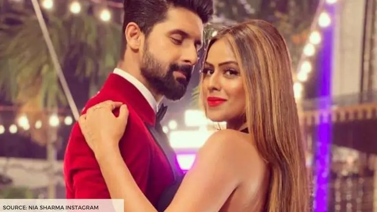 Nia Sharma posts a pic of her 'happily watching' Jamai 2.0; Ravi Dubey drops heart on post nia sharma