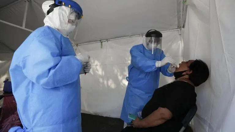 Mexico reaches 100,000 COVID-19 deaths