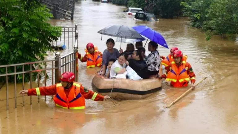 China floods: Millions of people affected, warning of 'extremely heavy' rainfall issued China floods