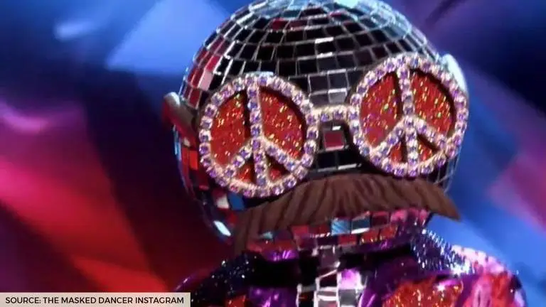 Who is the disco ball on the Masked Dancer that premiered on December 27? disco ball on the masked dancer