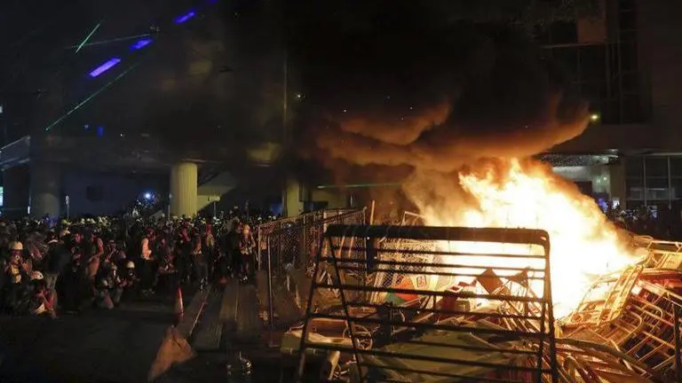 Hong Kong: Protesters clash with police at subway incident commemoration