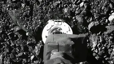 NASA spacecraft sent asteroid rubble flying in sample grab NASA spacecraft sent asteroid rubble flying in sample grab