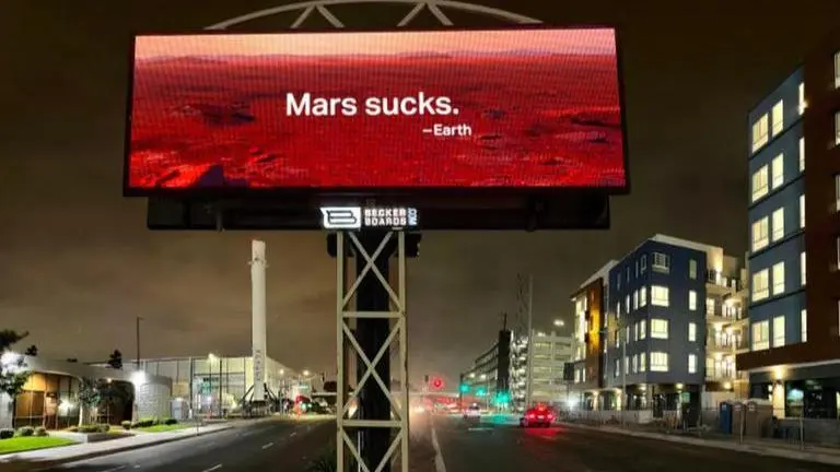 Elon Musk trolled with giant 'Mars Sucks' billboard outside SpaceX HQ on Earth Day Elon Musk