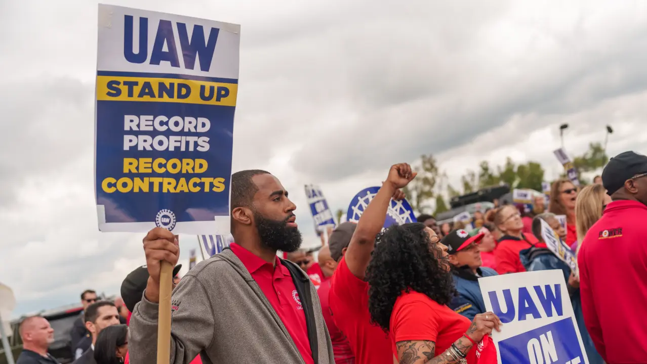 Auto Workers Union Accuses Trump and Musk of Illegal Threats Against Striking Workers UAW unionization victory