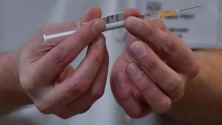 Under fire, France pledges speedier vaccination rollout