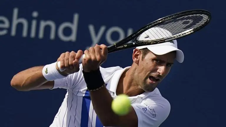 Djokovic's neck better, as is his play; now 20-0 in 2020