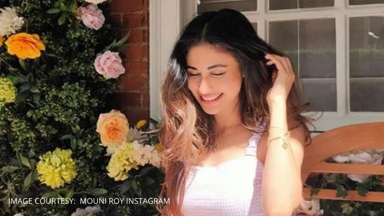 Mouni Roy looks delightful in a pink chic dress at a patisserie in London Mouni Roy