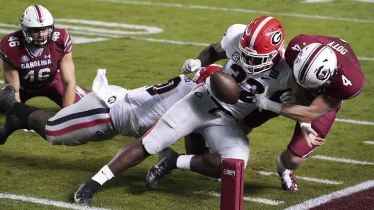 No. 13 Georgia runs all over South Carolina in 45-16 victory