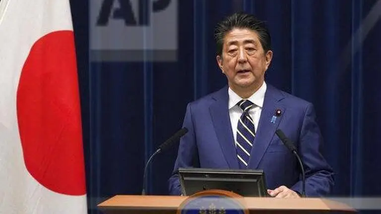 Japan PM Abe says country at critical stage in dealing with coronavirus infections