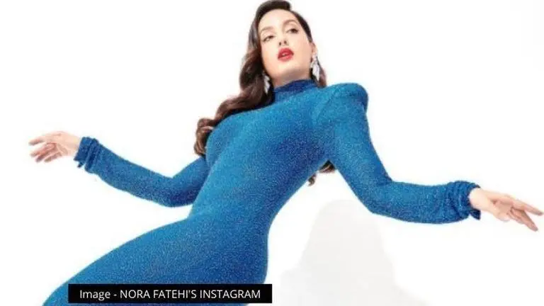 Nora Fatehi stuns fans in a dazzling blue dress, writes a tongue-twisting caption Nora Fatehi