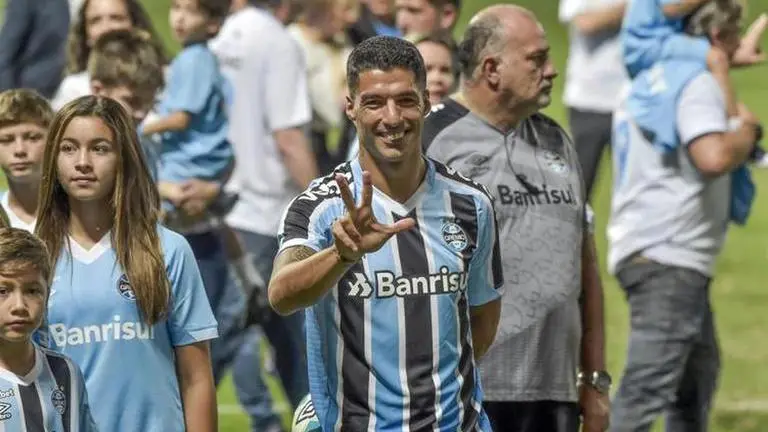 Luis Suarez scores hat-trick on his debut for Gremio in Brazil Luis Suarez