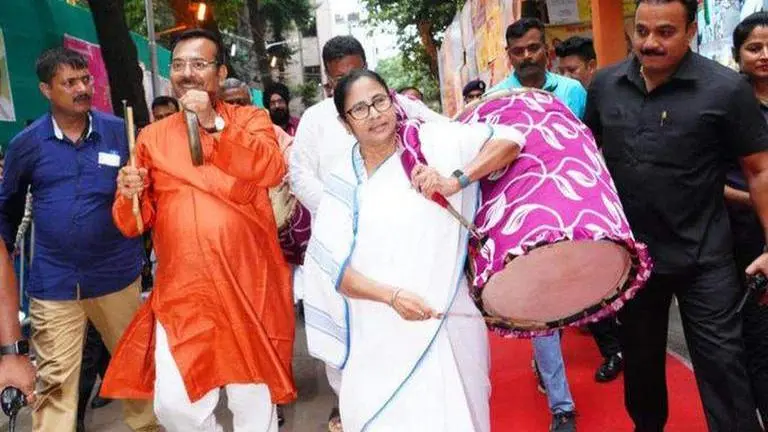 CM Mamata dives into festive spirit, plays dhak at Kolkata's Suruchi Sangha Pandal; watch Mamata Banerjee
