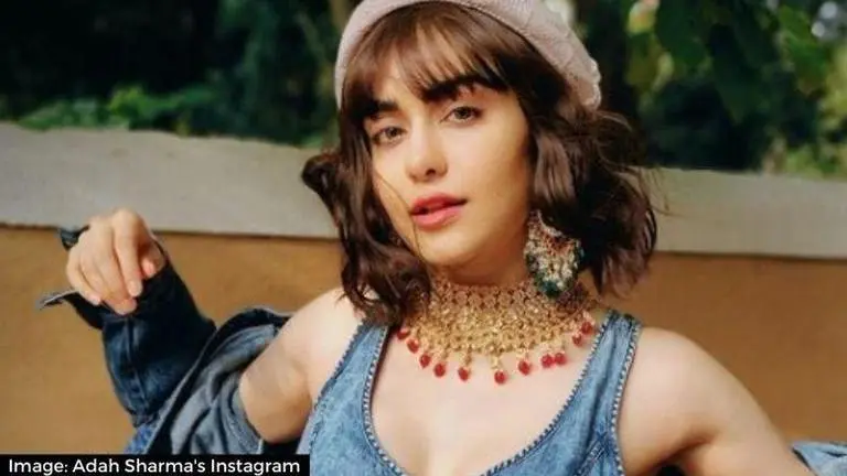 Adah Sharma shows how to do Shavasana without a mat, fans call her 'supergirl' Adah Sharma