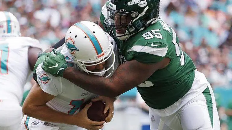 Jets' Quinnen Williams arrested for carrying gun at airport Jets' Quinnen Williams arrested for carrying gun at airport