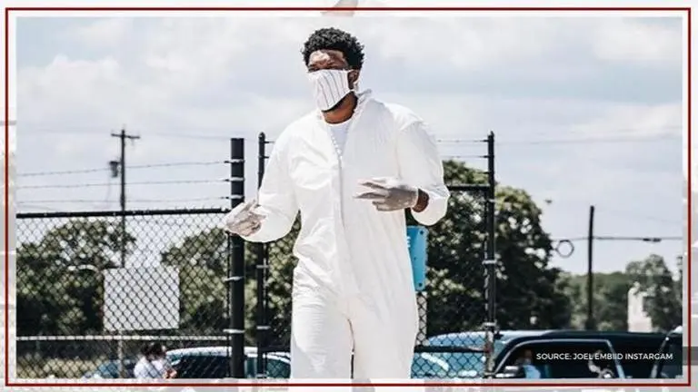 Joel Embiid wears hazmat suit en route to Orlando with Sixers, fans react with memes joel embiid hazmat suit