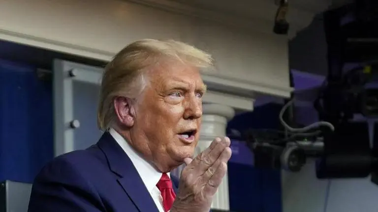 Trump disputes CDC head: masks 'may be effective'