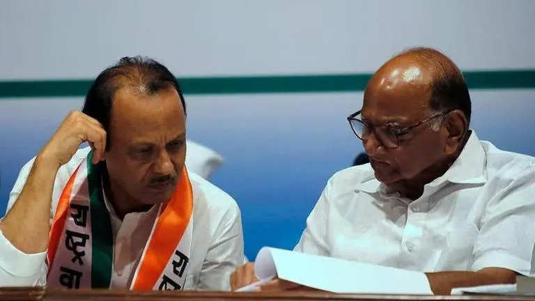 NCP President Sharad Pawar (R) with DY CM Sharad Pawar (L).