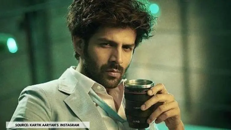 Kartik Aaryan shares a photo with camera lens-like coffee mug; tells fans 'it's a date' Kartik Aaryan