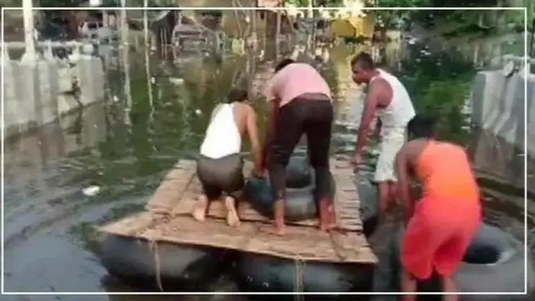 Bihar locals build makeshift boat to travel through flooded areas Bihar