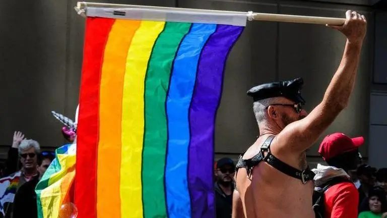 Thailand LGBTQ activists raise pride flag in anti-govt rally, demand military to step down Thailand