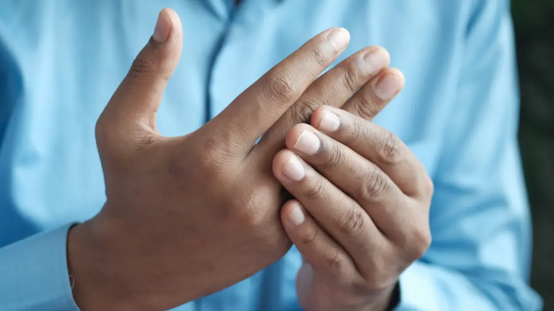 Stiff wrists? Practice These Work-Friendly Stretches To Increase Mobility On The Go wrist pain