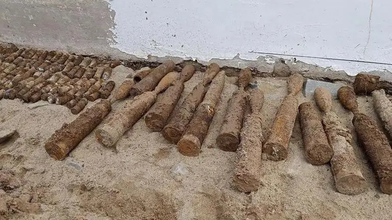 Cambodian school closed after thousands of pieces of unexploded ordnance found buried in ground