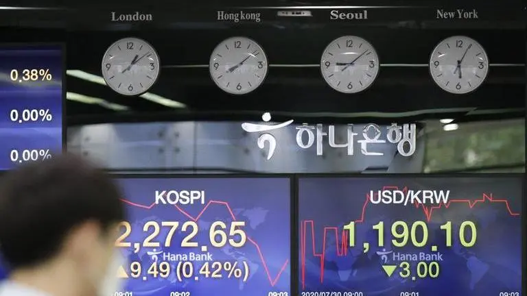 Asian stocks gain after Fed keep US interest rates low