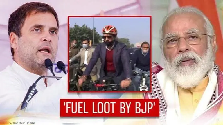 Amid high petrol & diesel prices, Robert Vadra rides cycle & Rahul Gandhi alleges 'loot' Rahul Gandhi
