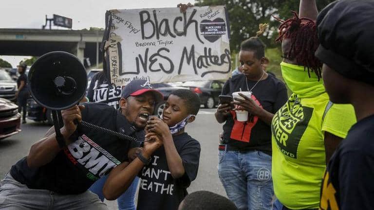 Atlanta: Former cop charged with murder for shooting black man ...