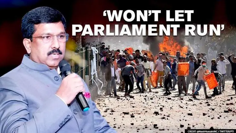 Congress, Opposition disrupt Parliamentary proceedings, demand discussion on Delhi riots Congress