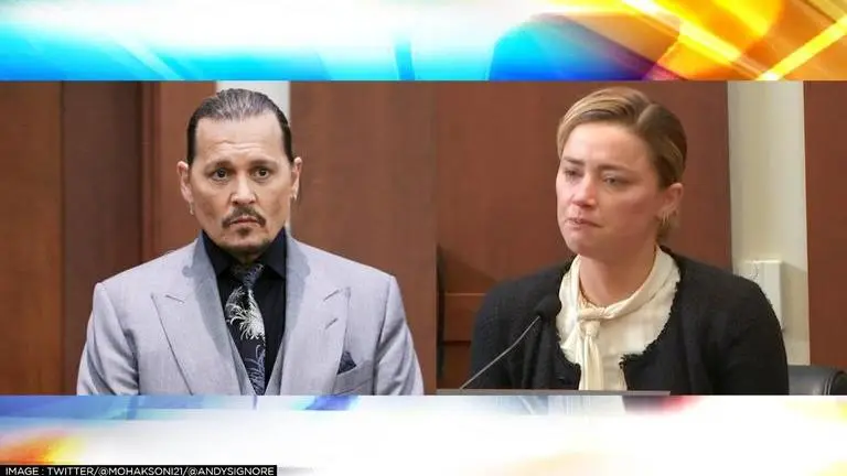 Johnny Depp's supporters claim 'Amber Heard was posing for photos' amid trial in court amber heard